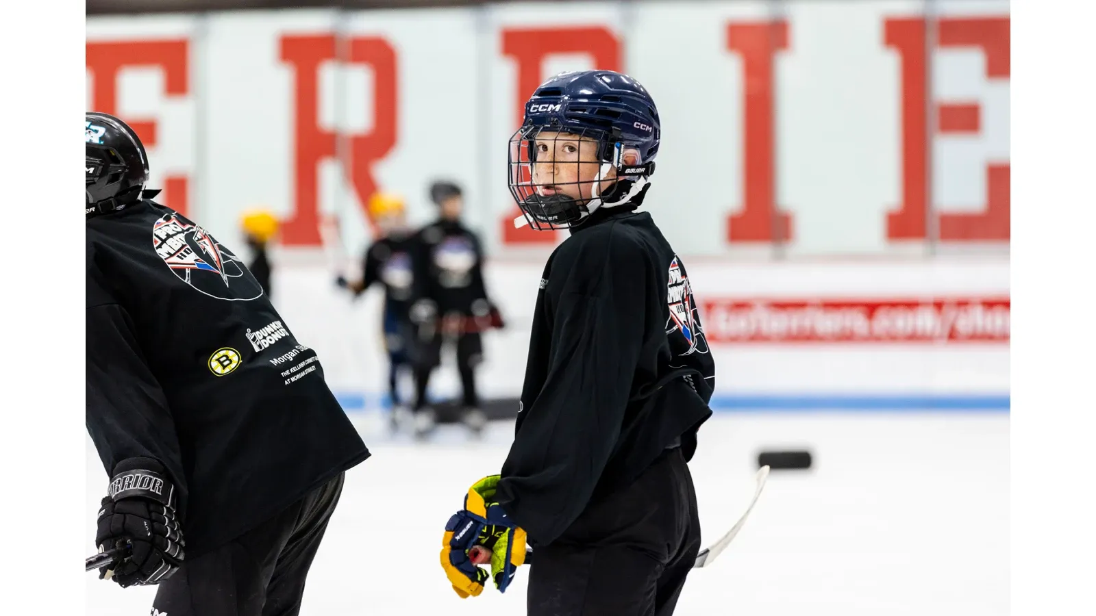 Young camper on the ice at Boston University
