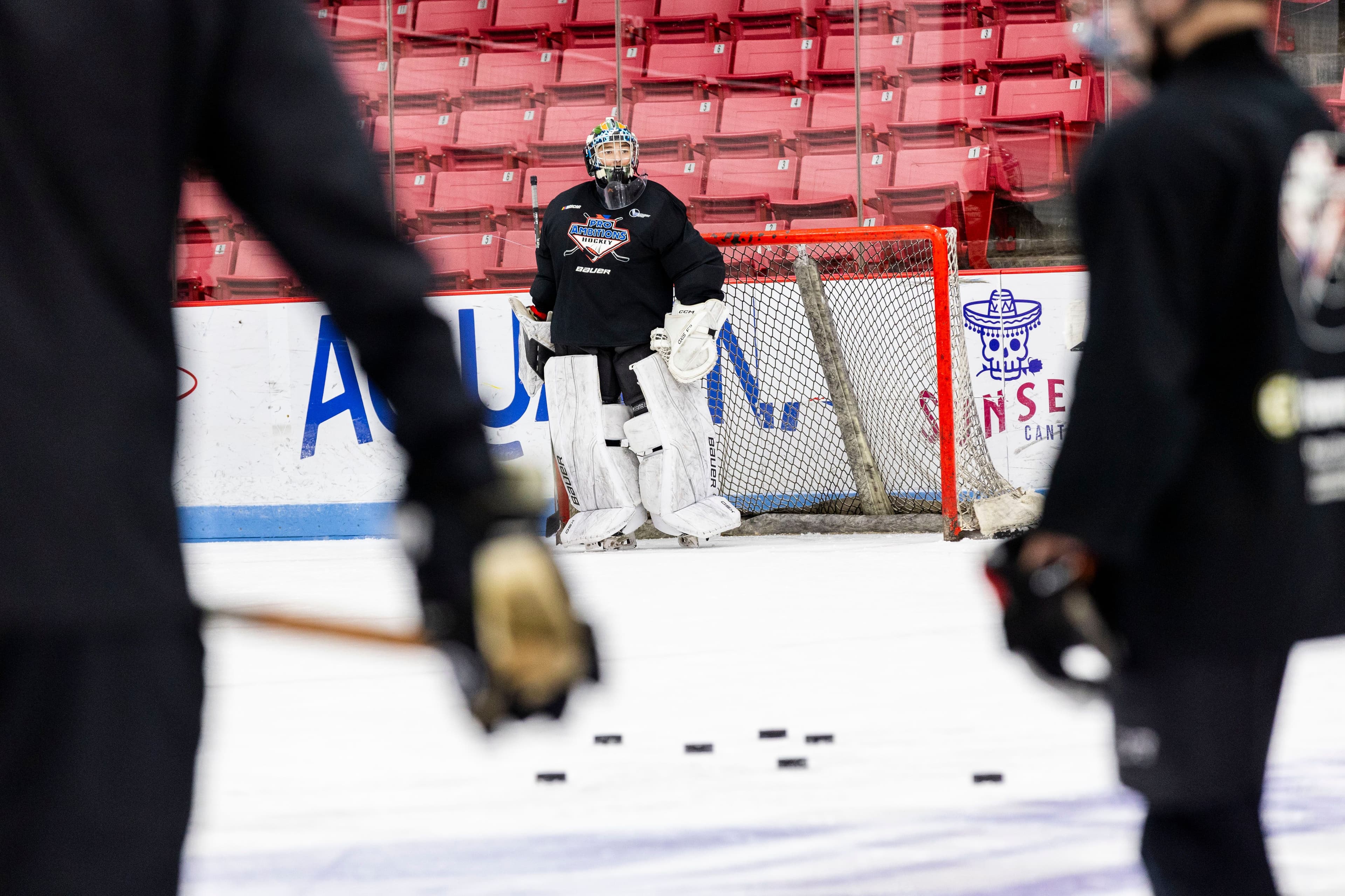 Goalie in the crease during a drill