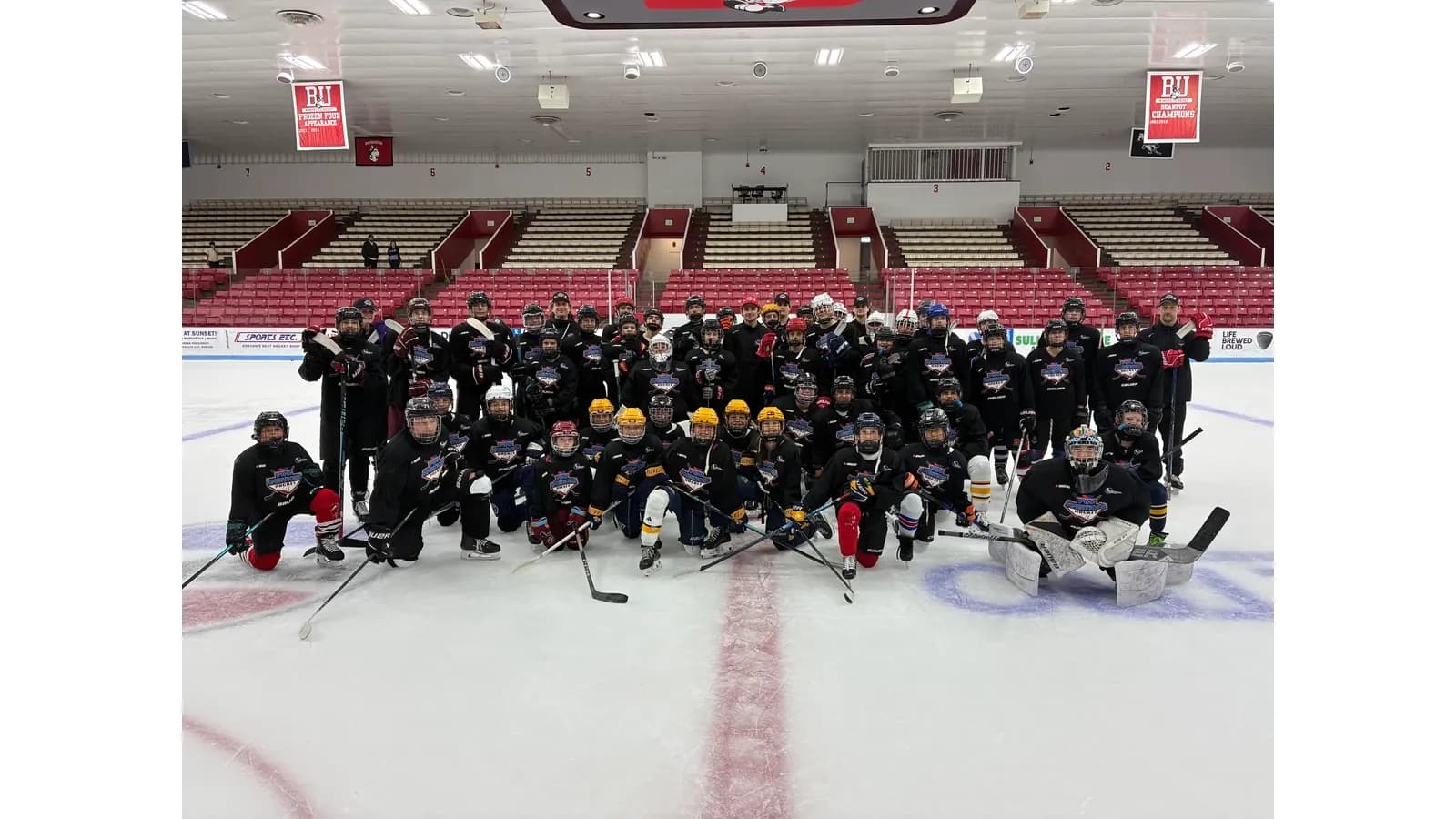 Camp group photo on the ice at Boston University