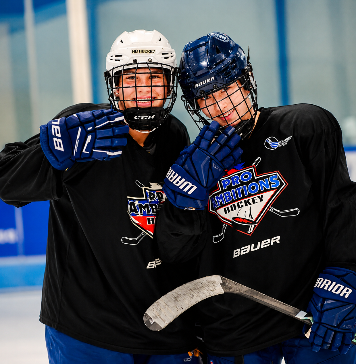 Pro Ambitions teammates celebrating on the ice
